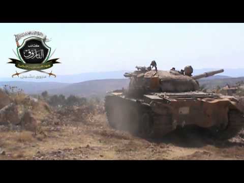 استهداف تحصينات قوات النظام في حاجز الجازر في منطقة أريحا في ريف ادلب بواسطة قذائف دبابة من قبل كتائب الفاروق