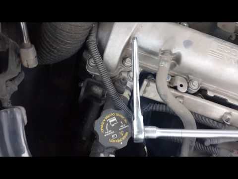 How to replace a spark plug in a 4 cylinder chevy engine