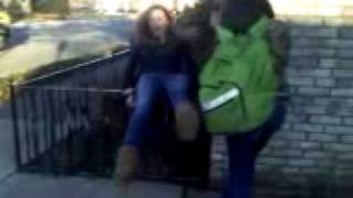 Autumn pushing Jackie off the fence