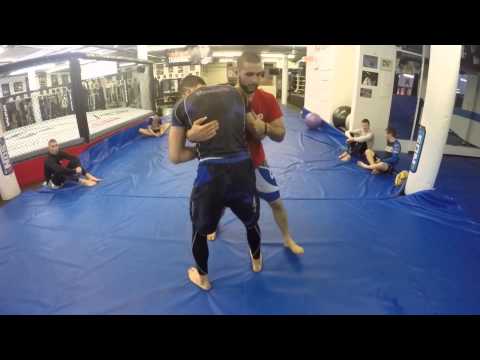 Clinch Takedown - Turning the Corner from Over Under Position - Firas Zahabi
