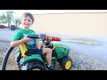 Playing with a firehose on the farm with tractors | Tractors for kids