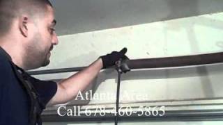 Garage Door Torsion Spring Repair - DIY Dangers Of Removing Torsion Springs