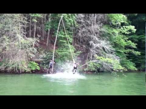 Logan on the rope swing at wataga lake