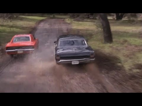 The Dukes of Hazzard: Reunion! 1997 | Bo and Luke get run off the road by a pair of locals |
