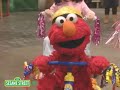 Sesame Street Elmo Riding A Tricycle