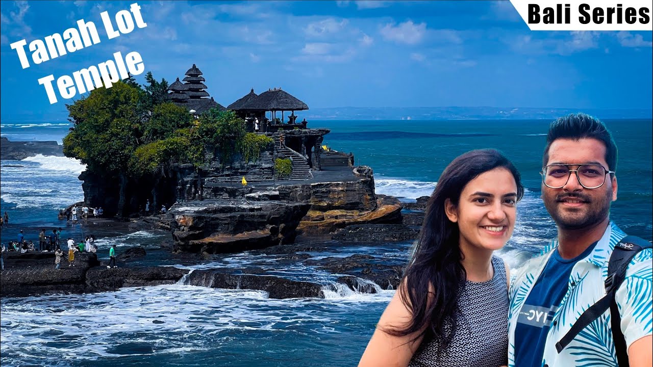 Experience the enchanting Pura Tanah Lot Temple as a duo embarks on its visit.