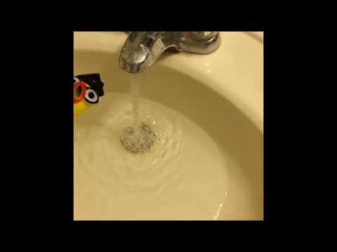 Putting happy music while drowning a chicken