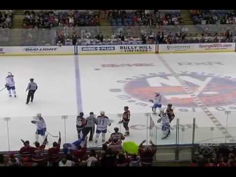 Mike Komisarek hits Jack Hillen