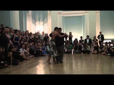  Alejandra Mantinan  and  Aoniken Quiroga  are  dancing  to  a  milonga
