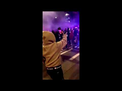 Police car charges Tacoma crowd watching street race