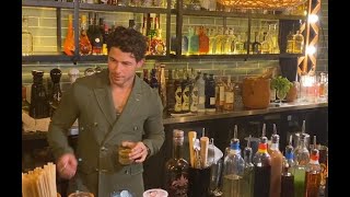 Nick Jonas Behind The Bar Of One Villa Tequila Bar In San Diego