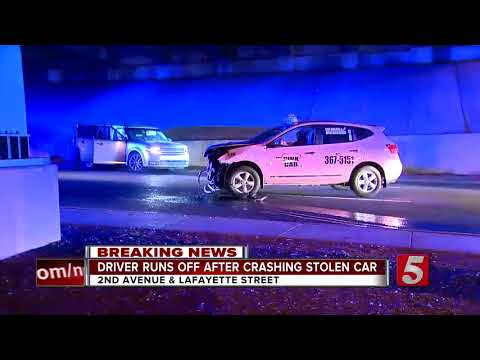 Driver Of Stolen SUV Runs Red Light, Crashes Into Taxi