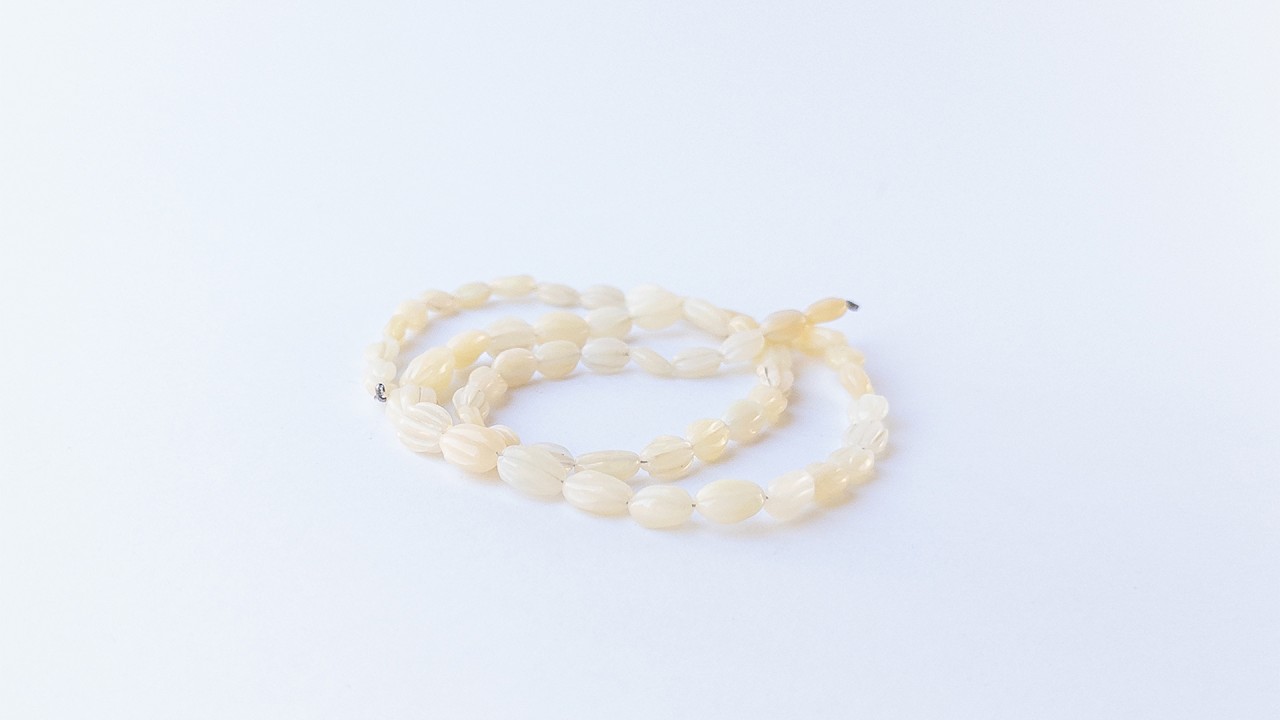 Ethiopian Opal | Carved Oval | 5-6mm Bead Size | 43cm Strand Length video