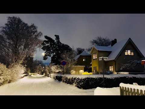 Snowy suburb streets. Walking among the houses to Spånga Center. 