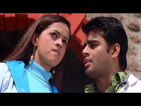 R Madhavan goes to Bhavana to her college to meet her personally she try to avoid him