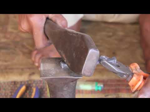 Touareg forging a  bracelet