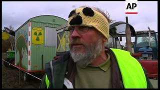 Protesters block train tracks ahead of nuclear transport