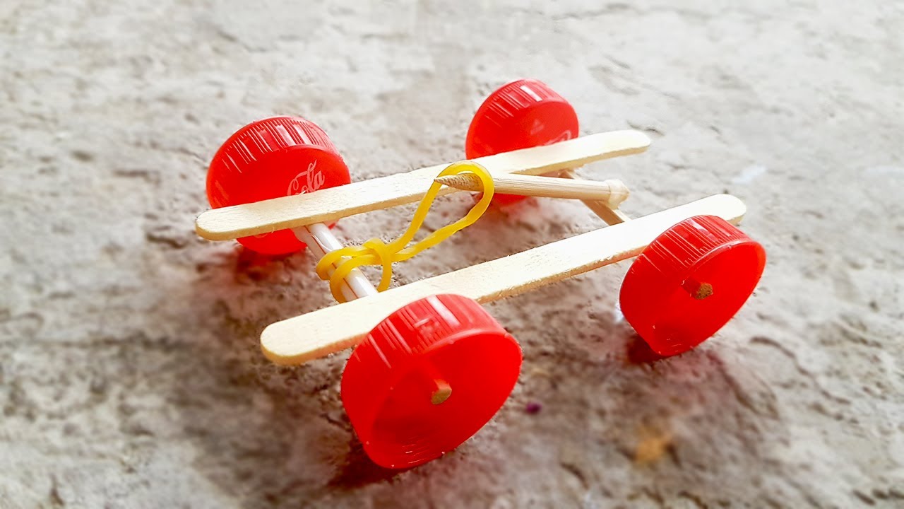 Como fazer um Carrinho Simples Movido a Elástico