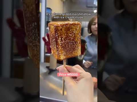 Trying flame grilled marshmallow in Seoul 🔥🦖 #streetfood #seoul #korea #food #hongdae #travel