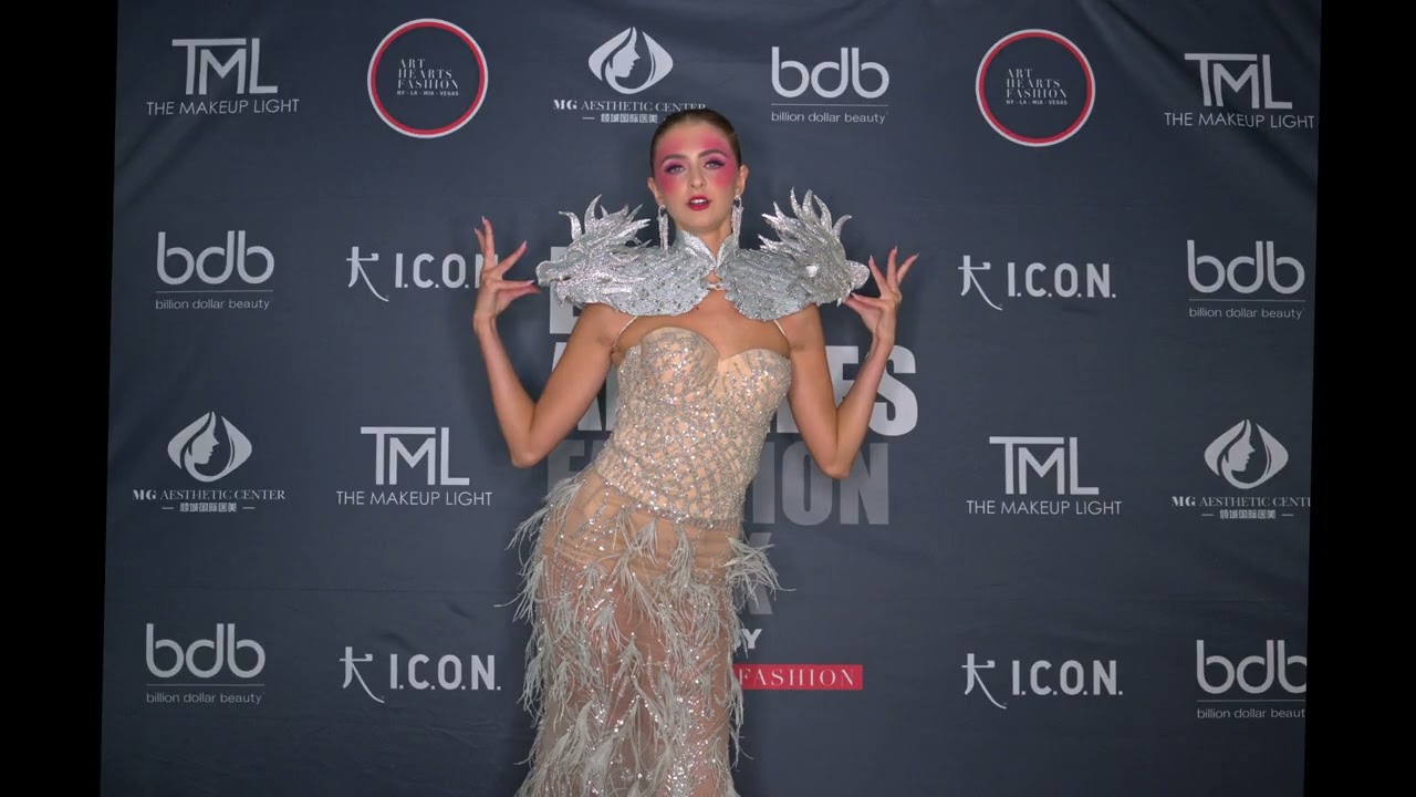 Model @Gracie_epperly_  poses wearing Designer @alexismonsanto at Art Hearts Fashion LA Fashion Week