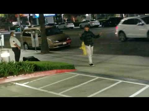 a little action at Kaiser Permanente (sunset) security guard comes out to intervene