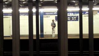 Tamio Shiraishi & Steve Baczkowski midnight 7/13/2012 E train Spring street station in Manhattan 2