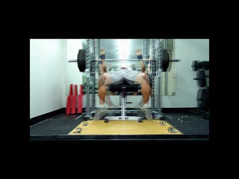 Raw bench press- 405x3 PR @238 pounds.