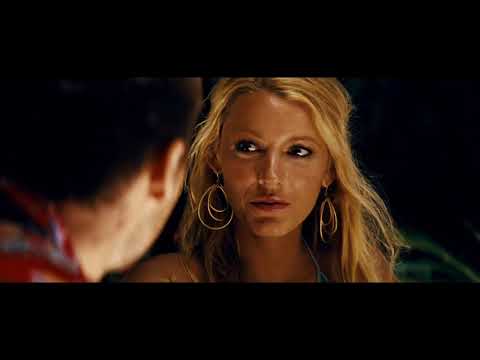 Savages (2012) official trailer frame — sunburned Pacific coast highway and a car racing toward trouble