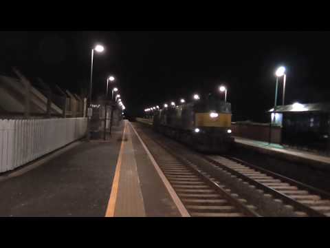 NIR 111 class locos 111 and 113 + 8 Irish rail spoil wagons passing Moira