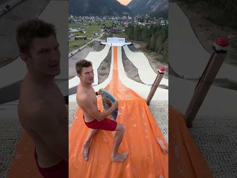 Massive Slip N’ Slide down a Ski Jump Ramp!