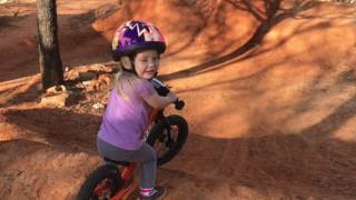 Lucy Sixo compound 2 year old bike rider