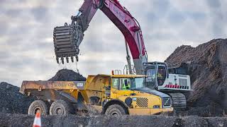 Link Belt 800LX Excavator loading Volvo A35 trucks