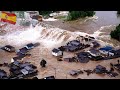 Spain is sinking in flood water! Historic storms and flash floods submerged houses and vehicles