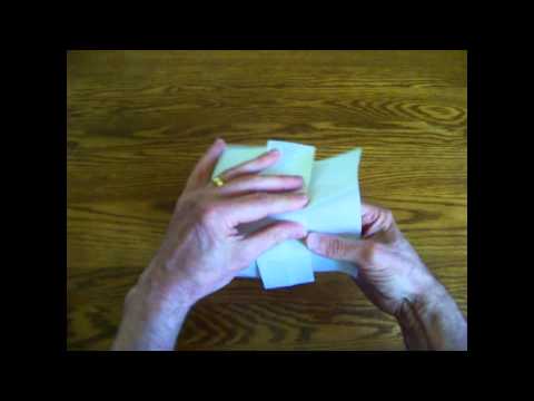 How to fold a pleated triangular prism.