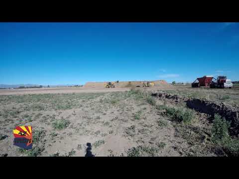 Loaders Filling Belly Dumps