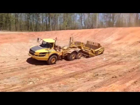 Volvo A35G pulling a K-Tec ADT 1228 Scraper