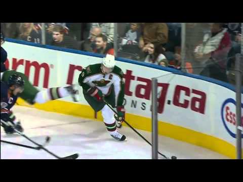 Dany Heatley's skate cuts Mikko Koivu in the Jaw [HD]