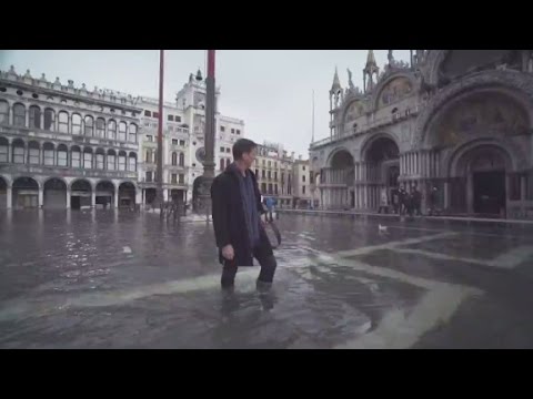 Sirens warn of a coming flood in Venice