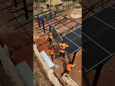 Installation of 100 panels carport.