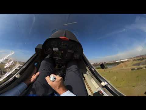 360° cockpit footage of a glider triple loop at ground level.