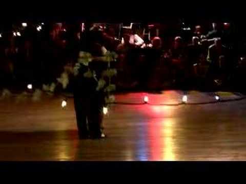  Corina de la Rosa  and  Julio Balmaceda  are  dancing  to  the  tango  "  La Mariposa  "