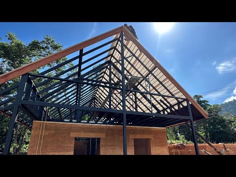 Building a rammed earth house in thailand