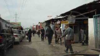 preview picture of video 'Bazaar in Bishkek, Kyrgyzstan, driving away.'