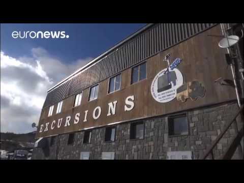 LiveLeak com   Mount Etna explodes showering BBC crew with rocks and magma