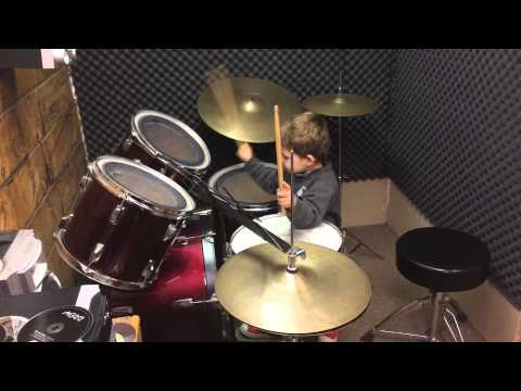 3 year-old plays the drums