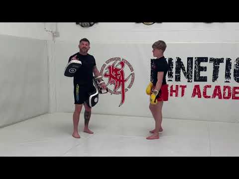 Muay Thai pad combo Jab - cross - left hook - low kick - body kick