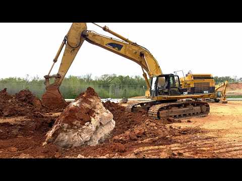 Caterpillar 365C Excavator vs. 80,000+ Pound Boulder