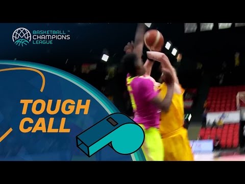 Tough Call: Clear offensive foul by player using his arm to dislodge his opponent