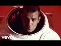 Videoklip Robbie Williams - Millenium  s textom piesne