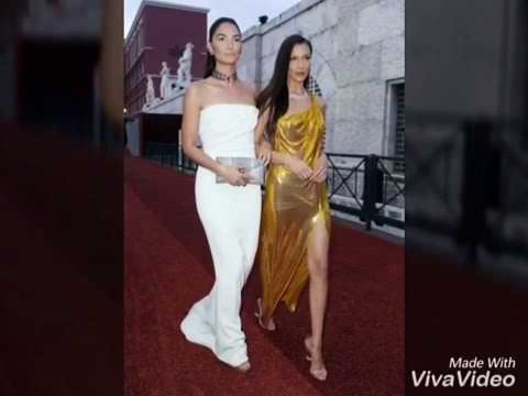 Bella Hadid Wears Gold Versace Dress In Rome
